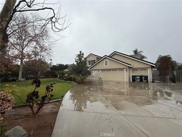 10854 Beltramo Cir, Riverside, CA 92503 - view of front of property featuring an attached garage and concrete driveway