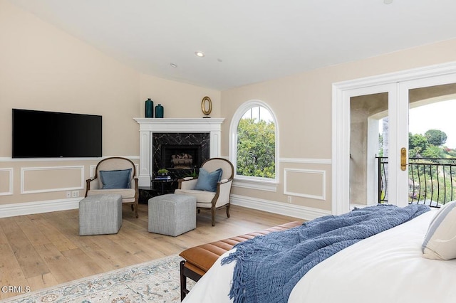 15450 Briarwood Dr, Sherman Oaks, CA 91403 - bedroom with access to outside, wood finished floors, a fireplace, vaulted ceiling, and recessed lighting