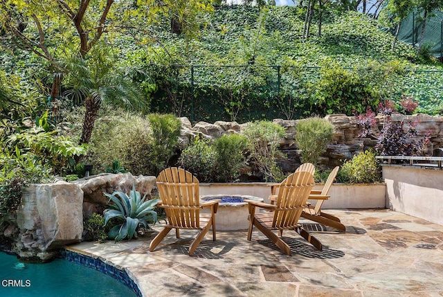 15450 Briarwood Dr, Sherman Oaks, CA 91403 - view of patio with an outdoor fire pit