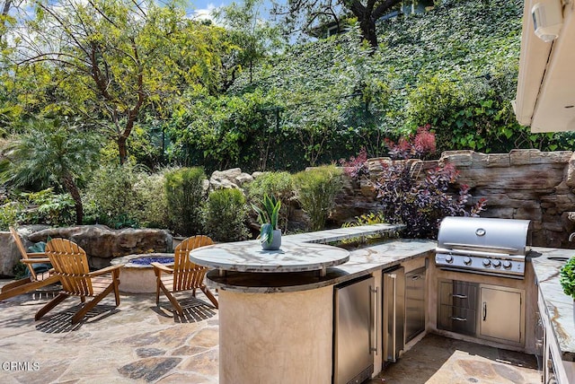 15450 Briarwood Dr, Sherman Oaks, CA 91403 - view of patio with a fire pit