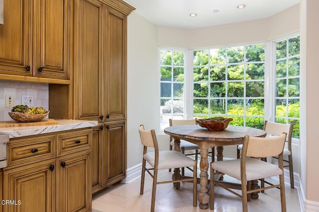 15450 Briarwood Dr, Sherman Oaks, CA 91403 - dining room with plenty of natural light, baseboards, light tile patterned floors, and recessed lighting