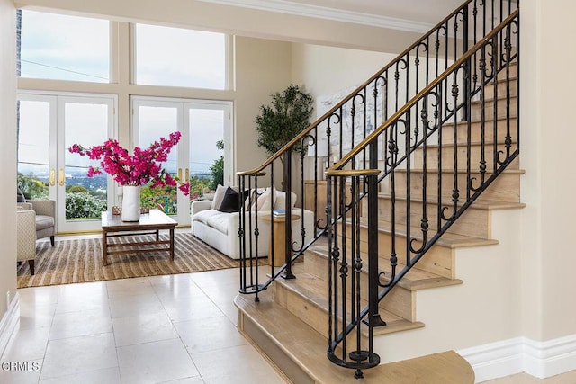 15450 Briarwood Dr, Sherman Oaks, CA 91403 - staircase featuring ornamental molding, tile patterned flooring, and french doors