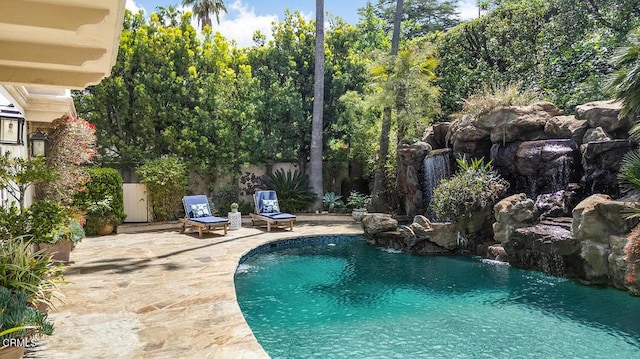 15450 Briarwood Dr, Sherman Oaks, CA 91403 - view of swimming pool with a patio area