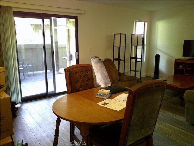 dining room with hardwood / wood-style flooring
