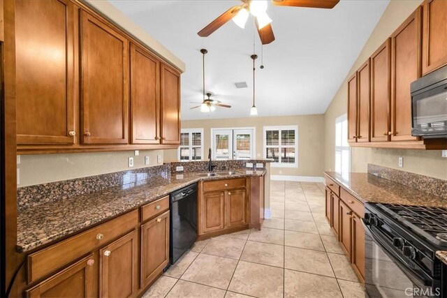 7566 Fox Trl, Yucca Valley, CA 92284 - kitchen with black appliances, ceiling fan, a sink, brown cabinets, and a peninsula
