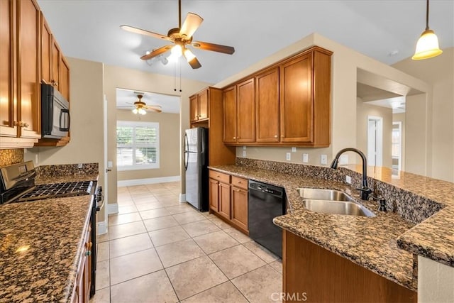 7566 Fox Trl, Yucca Valley, CA 92284 - kitchen featuring black appliances, a sink, ceiling fan, and brown cabinetry