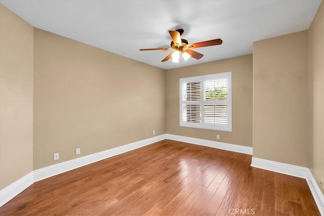 7566 Fox Trl, Yucca Valley, CA 92284 - empty room featuring baseboards, ceiling fan, and wood finished floors