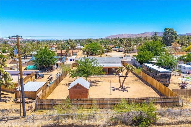 7566 Fox Trl, Yucca Valley, CA 92284 - aerial view of property and surrounding area featuring a mountain backdrop