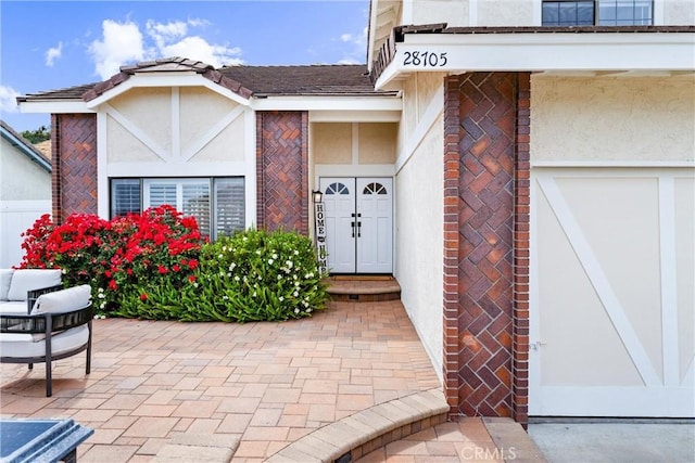 28705 Charreadas, Laguna Niguel, CA 92677 - doorway to property with stucco siding and a garage