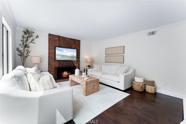 28705 Charreadas, Laguna Niguel, CA 92677 - living area featuring crown molding, dark wood-type flooring, a fireplace, and baseboards