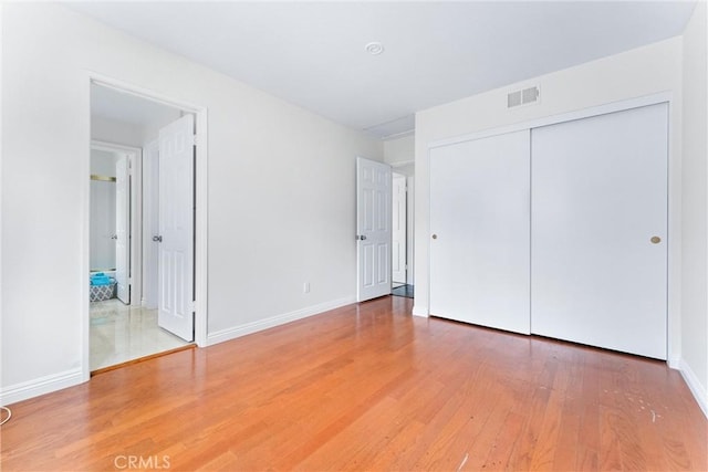 28705 Charreadas, Laguna Niguel, CA 92677 - unfurnished bedroom with wood finished floors, baseboards, and a closet