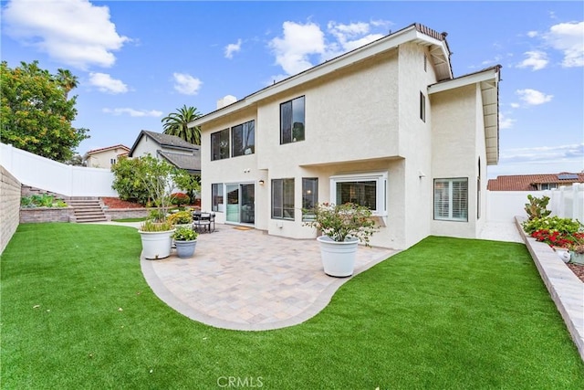 28705 Charreadas, Laguna Niguel, CA 92677 - back of property with stucco siding and a patio area