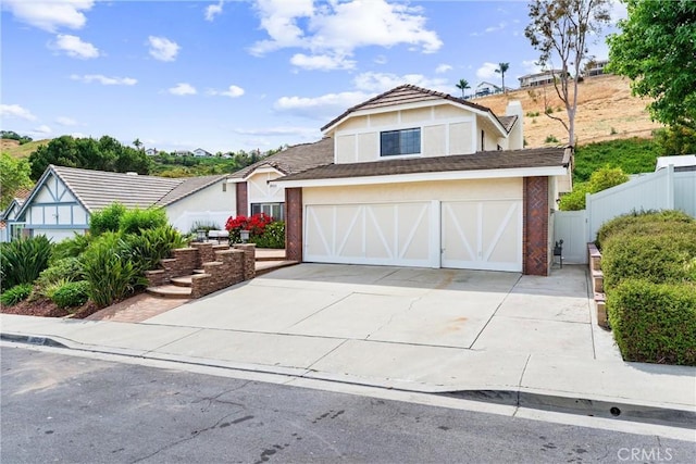 28705 Charreadas, Laguna Niguel, CA 92677 - view of front of home with concrete driveway, an attached garage, and stucco siding