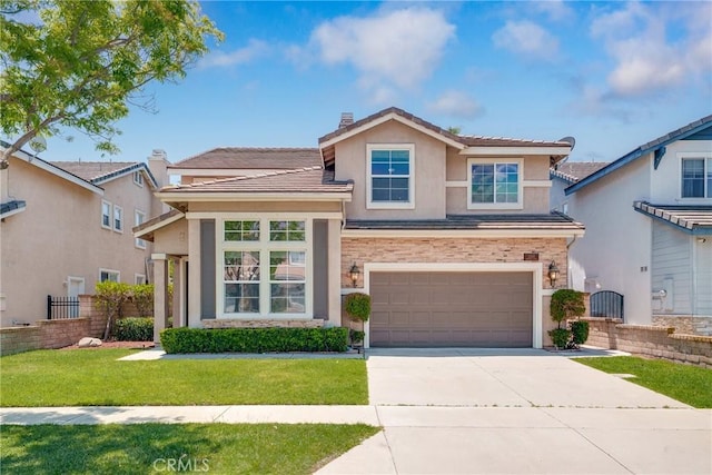 11345 Starlight Dr, Rancho Cucamonga, CA 91701 - traditional home with concrete driveway, stucco siding, a garage, stone siding, and a tile roof