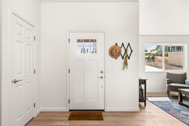 6333 Graham Rd, Paradise, CA 95969 - foyer entrance featuring baseboards and light wood finished floors