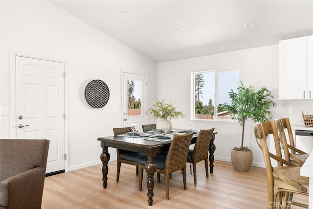 6333 Graham Rd, Paradise, CA 95969 - dining room with light wood-style floors, lofted ceiling, and baseboards