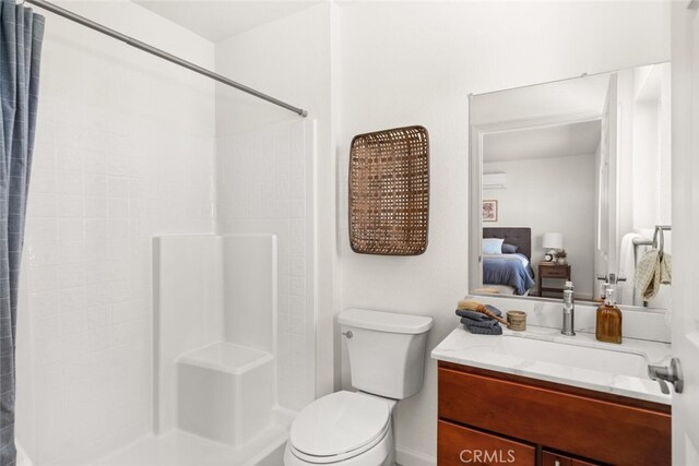 6333 Graham Rd, Paradise, CA 95969 - ensuite bathroom with a shower with shower curtain, toilet, and vanity