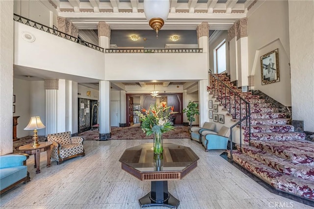140 Linden Ave Unit 615, Long Beach, CA 90802 - common area with a towering ceiling, stairway, and beamed ceiling