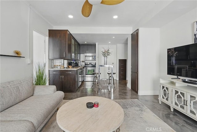 140 Linden Ave Unit 615, Long Beach, CA 90802 - living area featuring a ceiling fan, recessed lighting, and baseboards