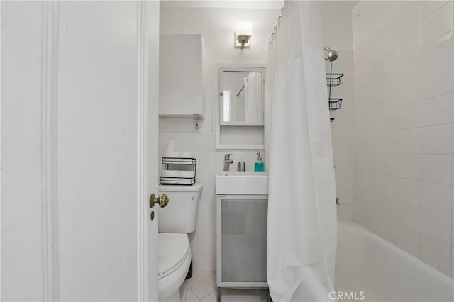 140 Linden Ave Unit 615, Long Beach, CA 90802 - full bathroom with toilet, tile patterned flooring, and shower / bath combo