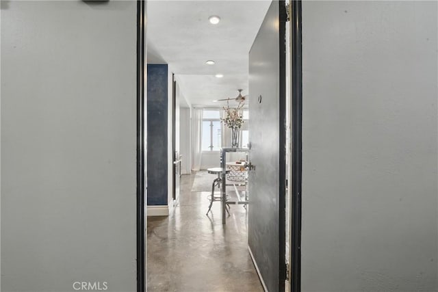 140 Linden Ave Unit 615, Long Beach, CA 90802 - hallway featuring finished concrete floors and baseboards