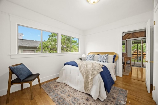 859 N Chester Ave, Pasadena, CA 91104 - bedroom featuring baseboards and wood finished floors