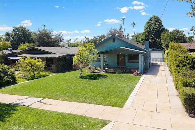 859 N Chester Ave, Pasadena, CA 91104 - view of front of house with a front lawn, a porch, and a garage