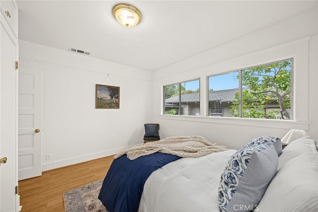 859 N Chester Ave, Pasadena, CA 91104 - bedroom featuring wood finished floors and baseboards