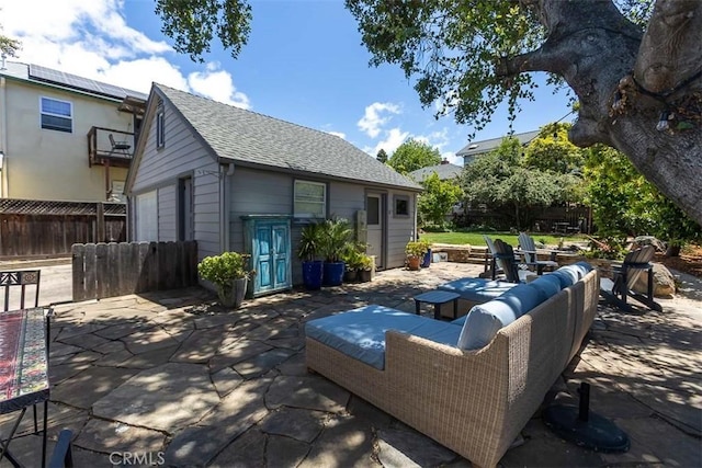 1443 Iris St, San Luis Obispo, CA 93401 - view of patio with an outbuilding and a garage