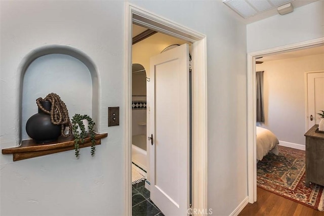 1443 Iris St, San Luis Obispo, CA 93401 - hallway with wood finished floors and baseboards