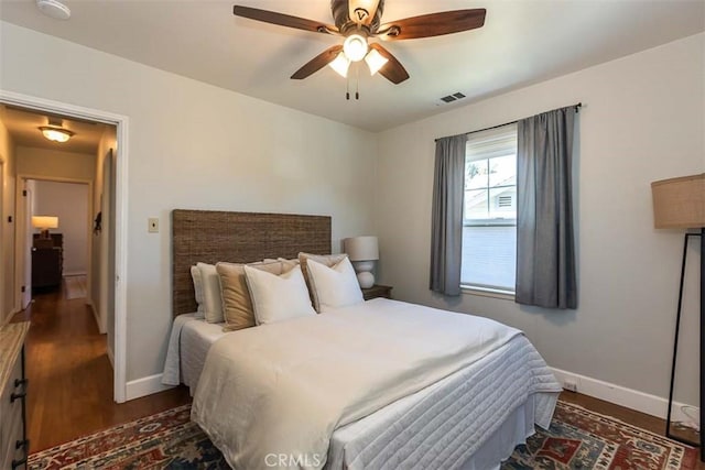 1443 Iris St, San Luis Obispo, CA 93401 - bedroom with wood finished floors, baseboards, and a ceiling fan