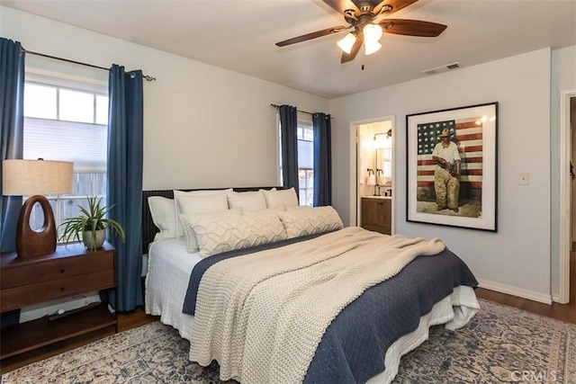 1443 Iris St, San Luis Obispo, CA 93401 - bedroom featuring multiple windows, wood finished floors, baseboards, and ceiling fan
