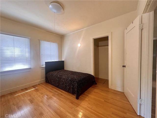 551 W Walnut Ave, Monrovia, CA 91016 - bedroom featuring light wood finished floors, ornamental molding, and baseboards