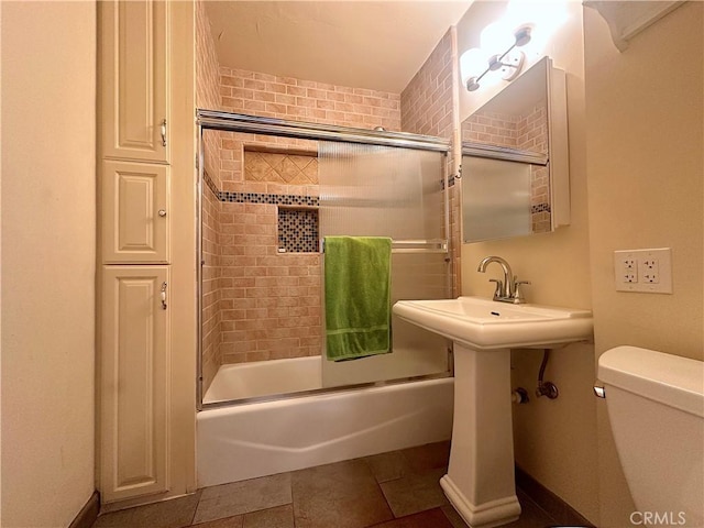 551 W Walnut Ave, Monrovia, CA 91016 - bathroom featuring toilet and shower / bath combination with glass door