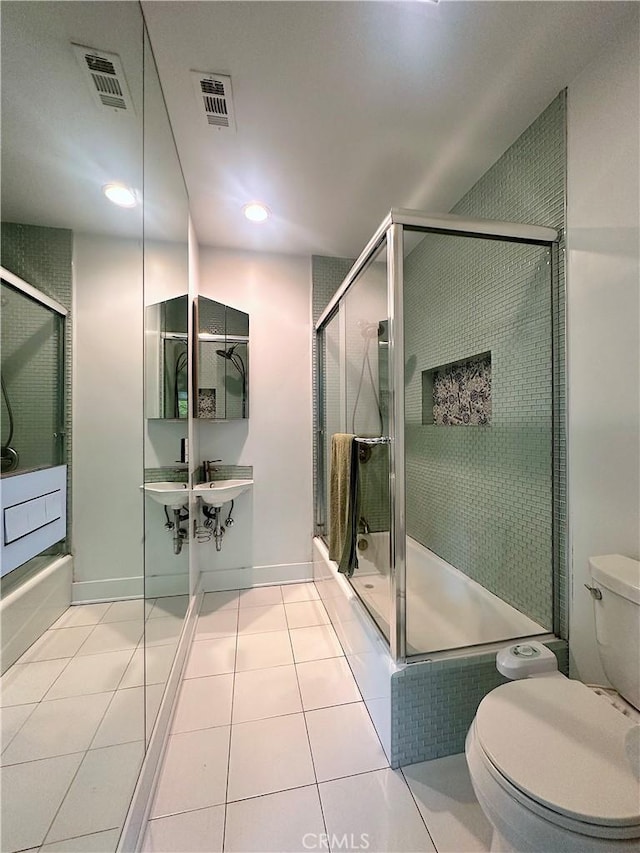 551 W Walnut Ave, Monrovia, CA 91016 - bathroom featuring toilet, a shower with shower door, tile patterned flooring, and recessed lighting