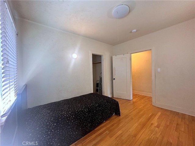 551 W Walnut Ave, Monrovia, CA 91016 - unfurnished bedroom with light wood-style floors