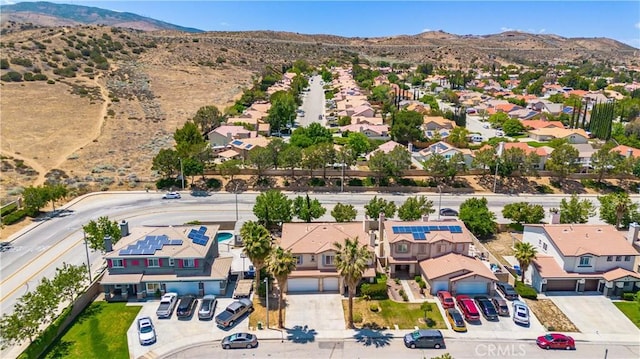 aerial perspective of suburban area featuring a mountainous background