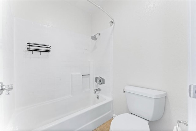 25641 Indian Hill Ln Unit C, Laguna Hills, CA 92653 - full bathroom featuring toilet, washtub / shower combination, and tile patterned floors