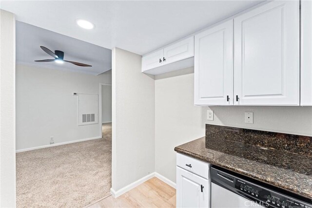 25641 Indian Hill Ln Unit C, Laguna Hills, CA 92653 - kitchen featuring stainless steel dishwasher, dark stone counters, ceiling fan, white cabinets, and crown molding
