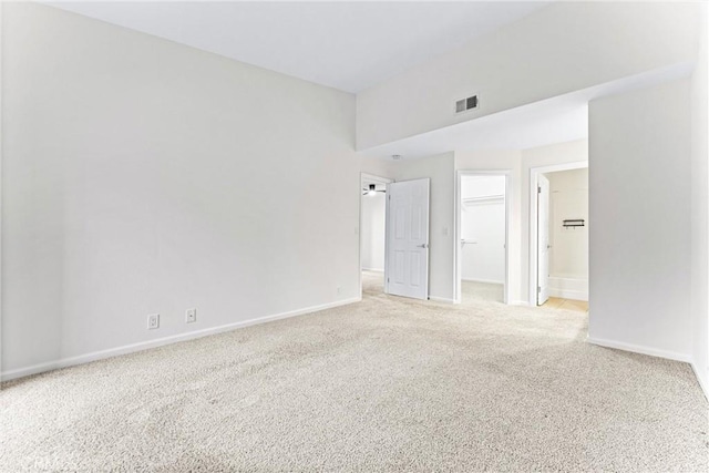 25641 Indian Hill Ln Unit C, Laguna Hills, CA 92653 - unfurnished room featuring light colored carpet and baseboards