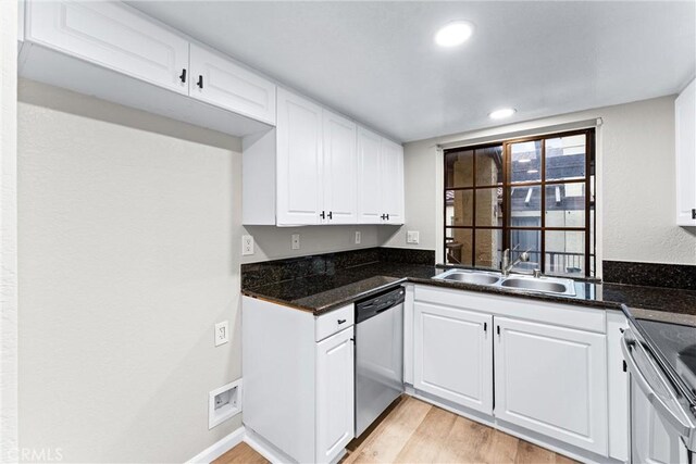 25641 Indian Hill Ln Unit C, Laguna Hills, CA 92653 - kitchen featuring appliances with stainless steel finishes, a sink, light wood finished floors, white cabinets, and recessed lighting