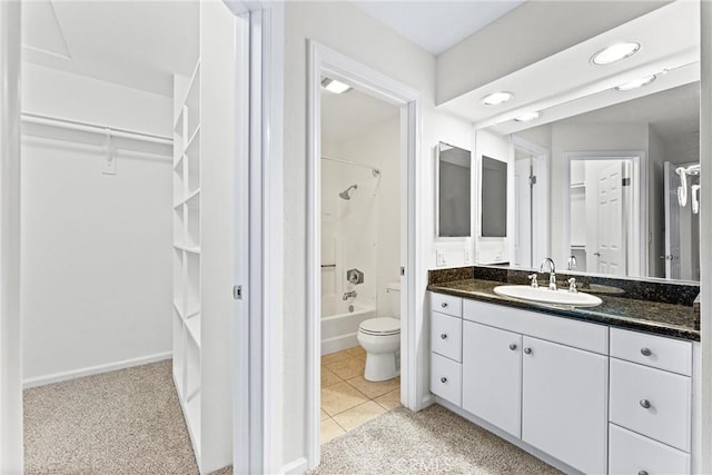 25641 Indian Hill Ln Unit C, Laguna Hills, CA 92653 - bathroom with vanity, shower / bath combination, toilet, a spacious closet, and tile patterned flooring