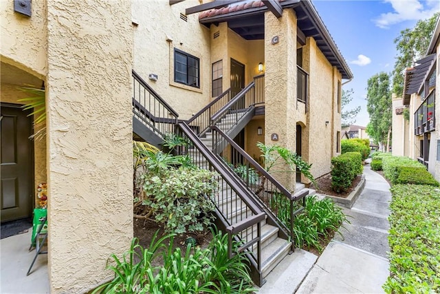 25641 Indian Hill Ln Unit C, Laguna Hills, CA 92653 - view of property featuring stairway