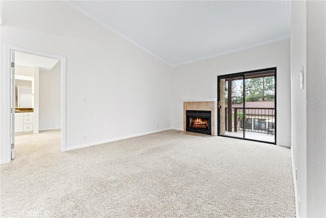 25641 Indian Hill Ln Unit C, Laguna Hills, CA 92653 - unfurnished living room with ornamental molding, carpet, a fireplace, and baseboards