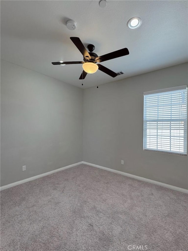 3397 Sequoia Ct, Perris, CA 92570 - unfurnished room featuring carpet flooring, baseboards, ceiling fan, and a smoke detector