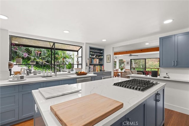 645 Griffith Way, Laguna Beach, CA 92651 - kitchen featuring a sink, stainless steel gas cooktop, recessed lighting, light stone countertops, and dark wood finished floors