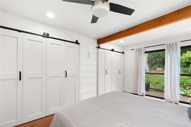 645 Griffith Way, Laguna Beach, CA 92651 - bedroom with a barn door, beam ceiling, recessed lighting, wood finished floors, and ceiling fan