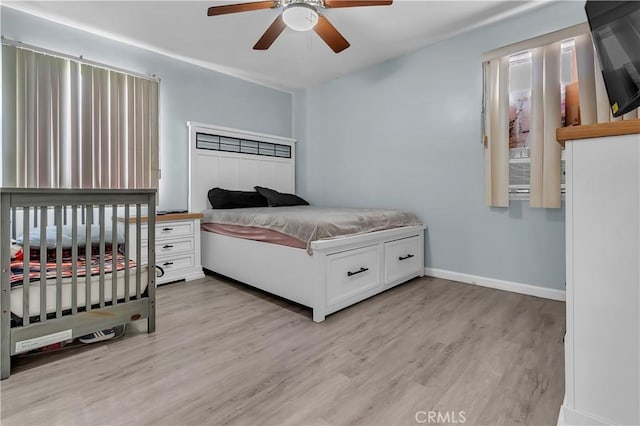 6038 Coke Ave, Long Beach, CA 90805 - bedroom with light wood-style flooring, baseboards, and ceiling fan