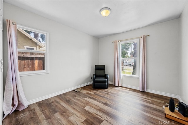 1980 N Sierra Way, San Bernardino, CA 92405 - unfurnished room with wood finished floors and baseboards