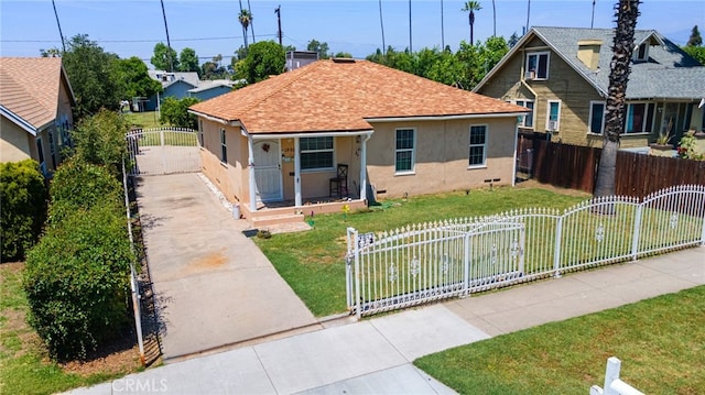 1980 N Sierra Way, San Bernardino, CA 92405 - bungalow-style house featuring a porch, stucco siding, a gate, roof with shingles, and concrete driveway